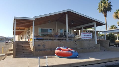 Front of the House on the RIver with plenty of space to Enjoy sights and sounds.