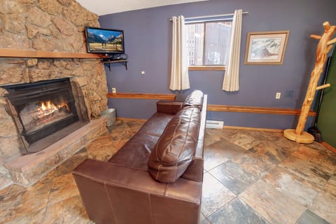 Living Room with Wood-Burning Fireplace
