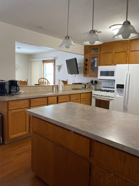 Kitchen includes dishes, pots, pans, crockpots, coffee maker, Keurig and more!