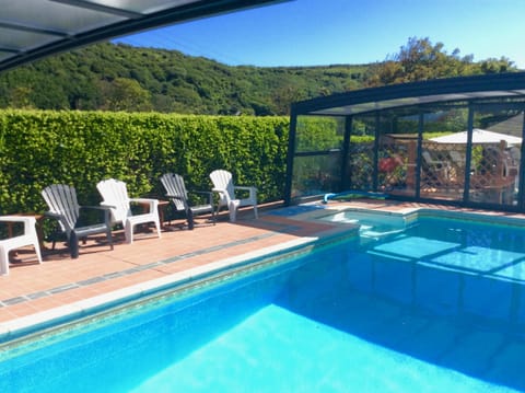 OUR HEATED POOL HAD A TELESCOPIC ENCLOSURE, ENJOY A SWIM AND RELAX
