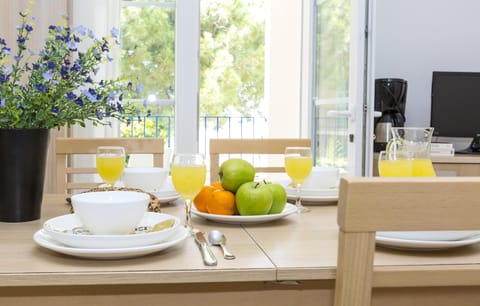 Share meals and laughs at the dining table.