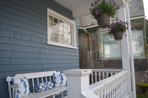 Great porch for reading and relaxing with a glass of wine