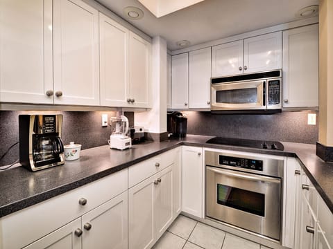 Stainless steel appliances in the kitchen.