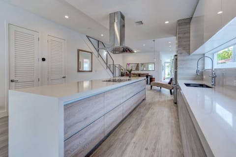 View from the countertop of the kitchen to the entrance of the house