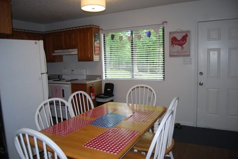 plenty of  room at the table and new stove and fridge!