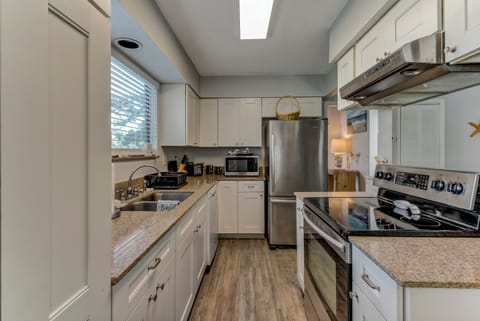 Fully Equipped Kitchen with Beautiful Granite Countertops and Stainless Steel Appliances
