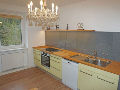 Cabinetry, Property, Kitchen Sink, Sink, Countertop, White, Kitchen Stove, Tap, Wood, Lighting