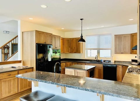 Kitchen with gas range and double oven