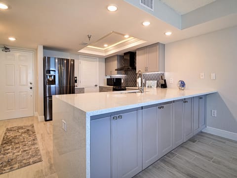 Plenty of counter space in this modern kitchen.