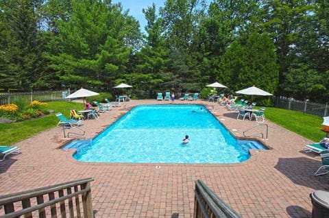Community shared in-ground heated pool (summer only)
