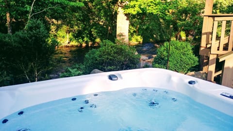 Relax in the Hot Tub while listening to the birds chirp or the creek sing...