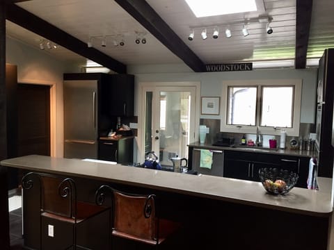 Alternate view of the kitchen. Great counter for serving!