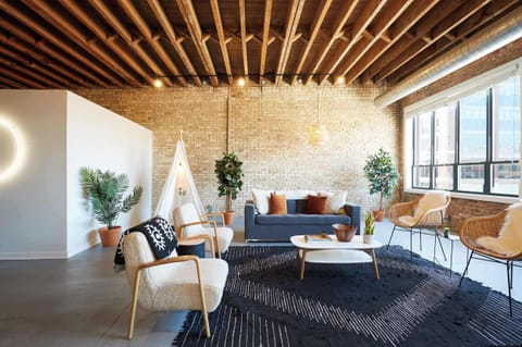 Huge open living area with great views of Fulton Market below