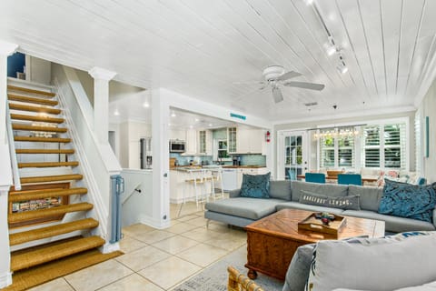 Main Floor Living , Dining and Kitchen with stairs to top floor