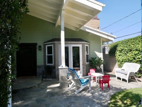 Front yard/patio, fully enclosed/gated, seating area, dutch doors, french doors