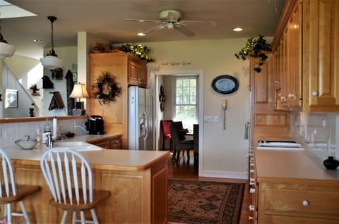 Fully furnished kitchen. All you need to cook a meal.  Joining dining room.