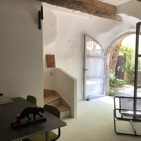 Full opening glass doors open up onto the courtyard garden