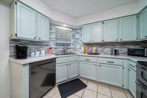 Fully stocked kitchen with Keurig coffee maker