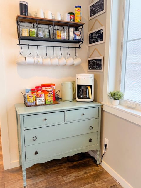 Coffee bar stocked with coffee grounds, creamers, sweeteners, and teas!