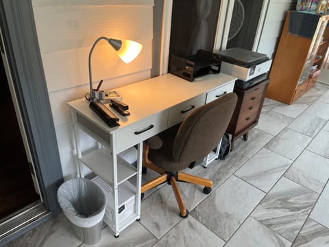 Complete work from "home" area includes desk, printer and office supplies