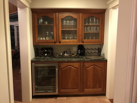 Dry bar off the kitchen and dining room