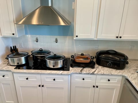 crock pots, 1 griddle, 1 skillet, 1 electric roasters. A rare find in a rental