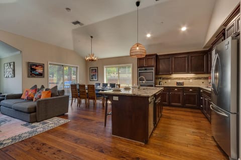 - Open concept kitchen and dining with modern design  
- Granite countertops and stainless steel appliances  
- Spacious Airbnb kitchen near Lake Tahoe for groups