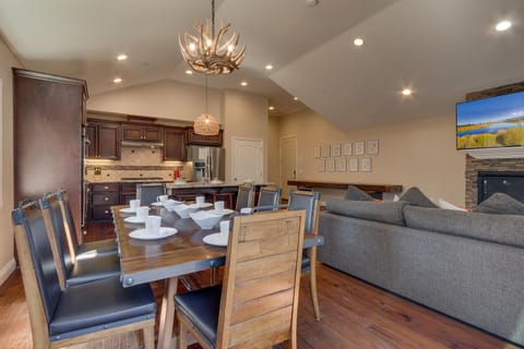 - Open concept dining with kitchen and living views  
- Spacious seating and cozy fireplace for group meals  
- Lake Tahoe Airbnb ideal for entertaining large groups