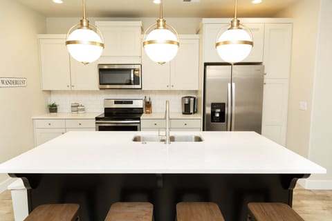 Kitchen island, appliances and seating