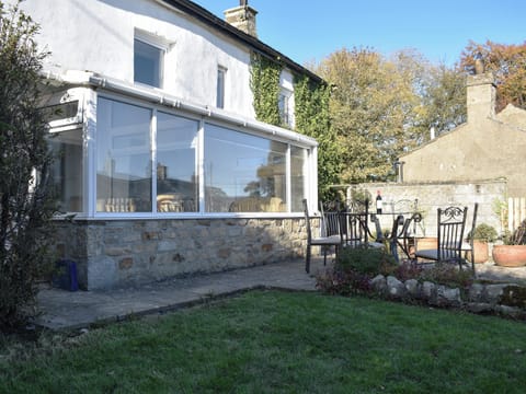Garden and outdoor seating area | Thistle Cottage, Carlton-in-Coverdale