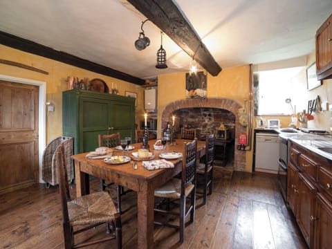 Welcoming dining area | The Old Priory Cottage, Dunster, near Minehead