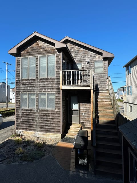 Two separate entrances.  Small deck with small seating area and ocean view!