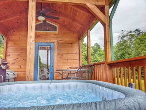 The hot tub is only steps from the door on the deck