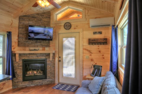 Relax at the Fireplace and enjoy the rain pitter-patter on the roof.