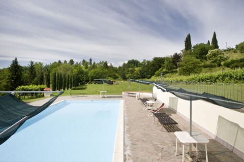 Swimming Pool, Outdoor Furniture, Composite Material, Tile, Shade, Sunlounger, Resort, Yard, Landscaping, Conifer