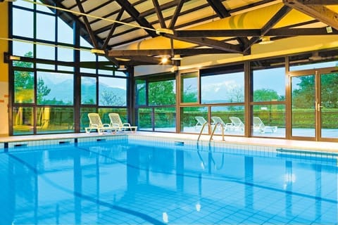 Dive into the lovely indoor pool after a great day!