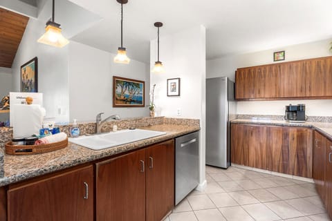 Fully equipped kitchen with ample counter space, ideal for easy in-home meals.