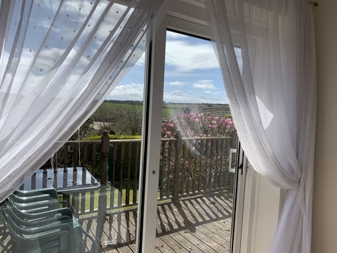 Lounge Diner with patio doors onto sunny decked area