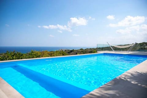 Sun-soaked pool area perfect for private swims and unwinding.