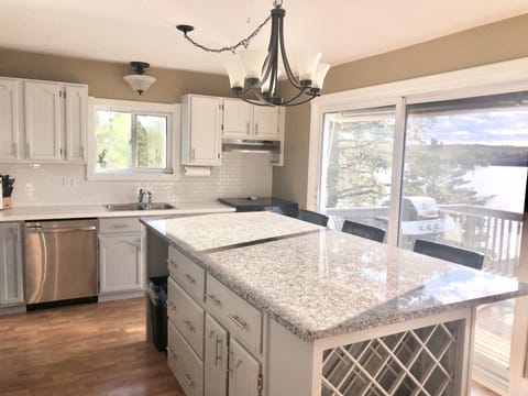 Kitchen of main floor patio with BBQ