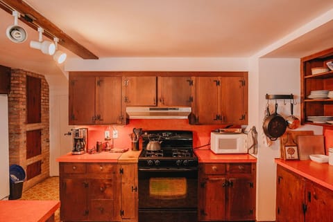 Gas stove and oven; microwave; coffee maker and french press; blender; 