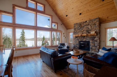 Great room w/gas fireplace. Overlooks Baby Lake (Winter).