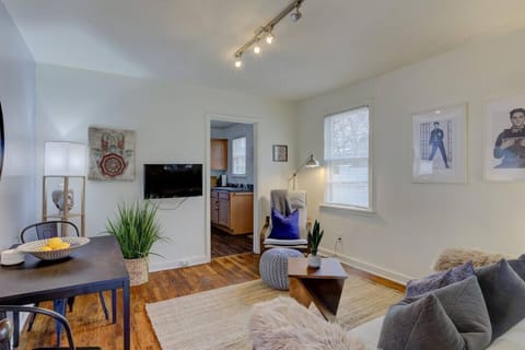 Settle in with the smart TV, grab a seat on the sofa, or enjoy dinner for two.