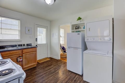 Full laundry setup with an in-unit washer and dryer.