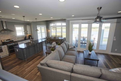 View of open kitchen/den/dining