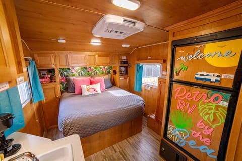 Take a load off by resting on our comfy Queen bed and grab a snack or beverage from the large refrigerator!