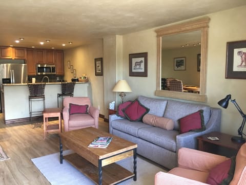 Living room with view to kitchen