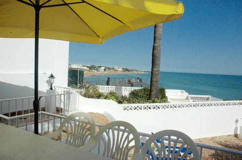 terrace with table, chairs and a built in BBQ with incredible views
