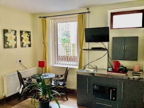 Downstairs living/dining/kitchenette; ensuite  