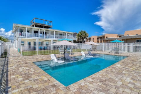 Escape to paradise in this luxury beachfront home featuring incredible ocean views, a brand new heated pool, and private beach access!